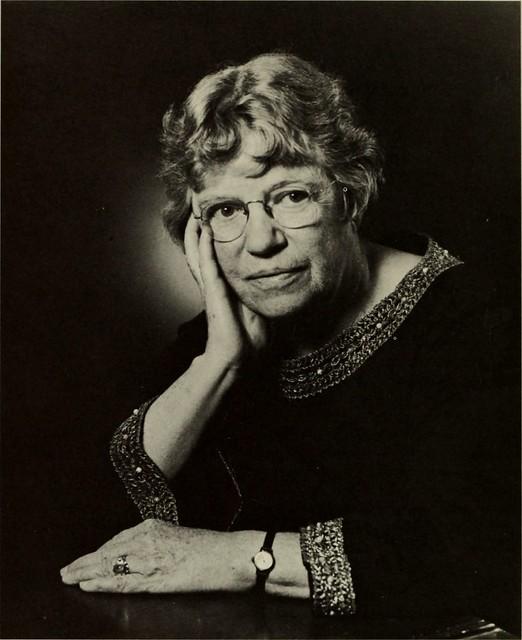 Historic photo of a middle-aged woman in dark blouse.