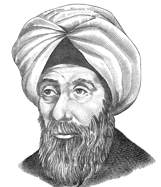 A person with a full beard and turban looks into the distance.